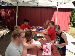 Photo of kids learning folk arts.